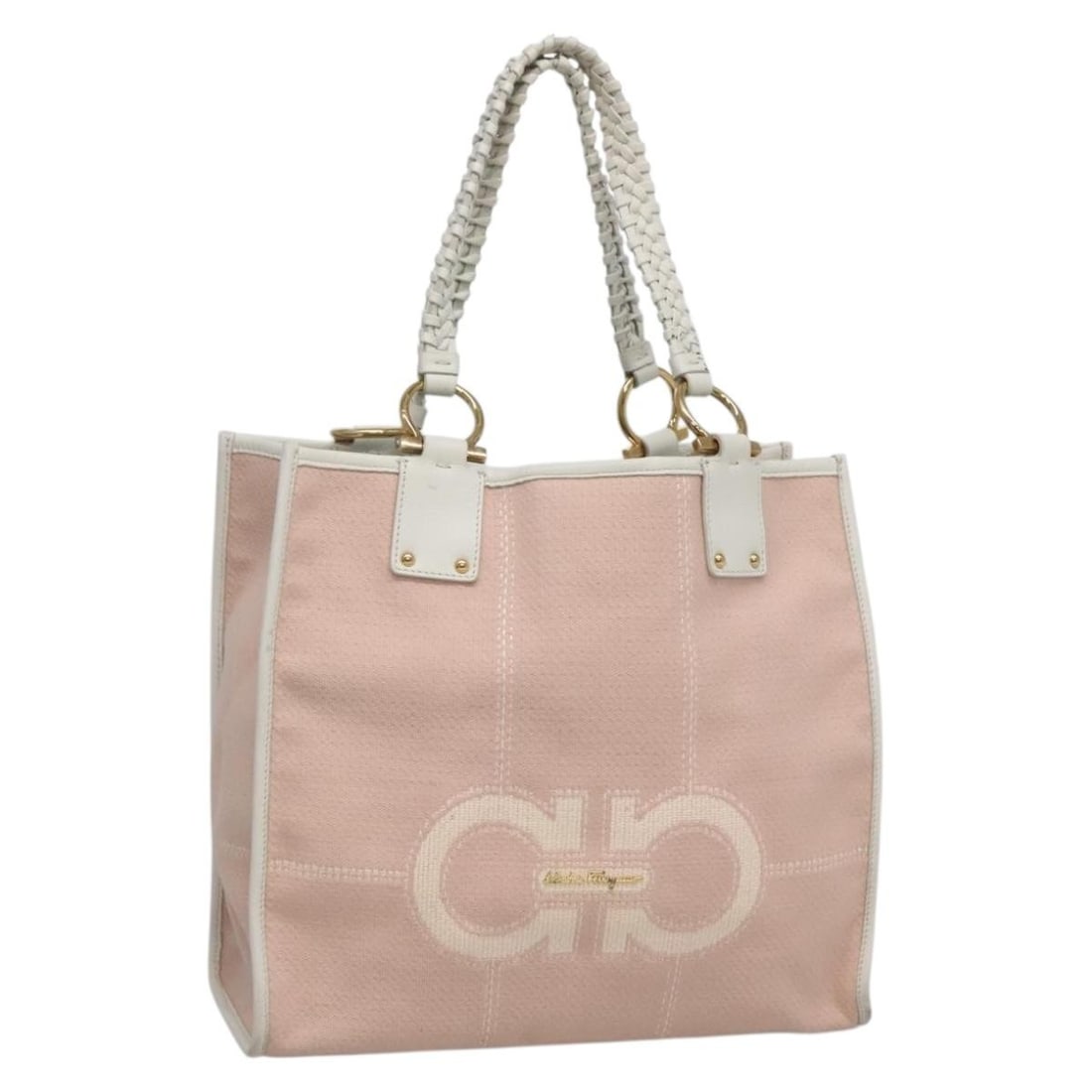 Gancini Canvas and Leather Pink White Gold Tote by Salvatore Ferragamo: Gancini Canvas and Leather Pink White Gold Tote by Salvatore Ferragamo This Salvatore Ferragamo Gancini tote bag is crafted from pink, white, and gold-toned canvas with leather accents. Designed for w