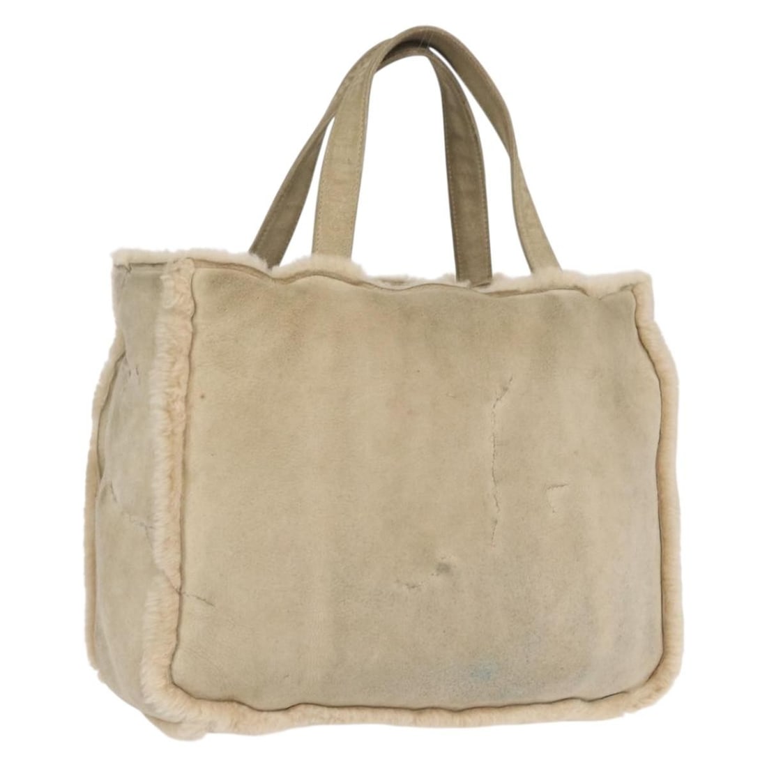 Beige Canvas Tote with CC Logo by CHANEL: Beige Canvas Tote with CC Logo by CHANEL This CHANEL tote bag features a beige canvas exterior with the iconic CC logo. Made in France, it offers a spacious interior and practical design, suitable for