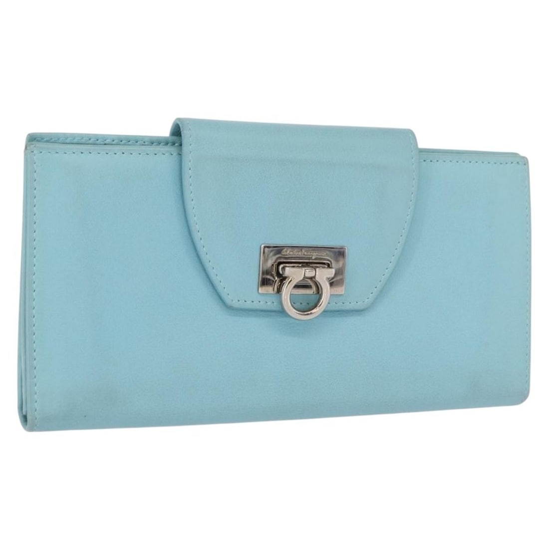 Lavende Leather Gancini Long Wallet by Salvatore Ferragamo Silver Accents: Lavende Leather Gancini Long Wallet by Salvatore Ferragamo Silver Accents This Salvatore Ferragamo Gancini long wallet is crafted from leather in a lavender and silver color combination. Designed in I