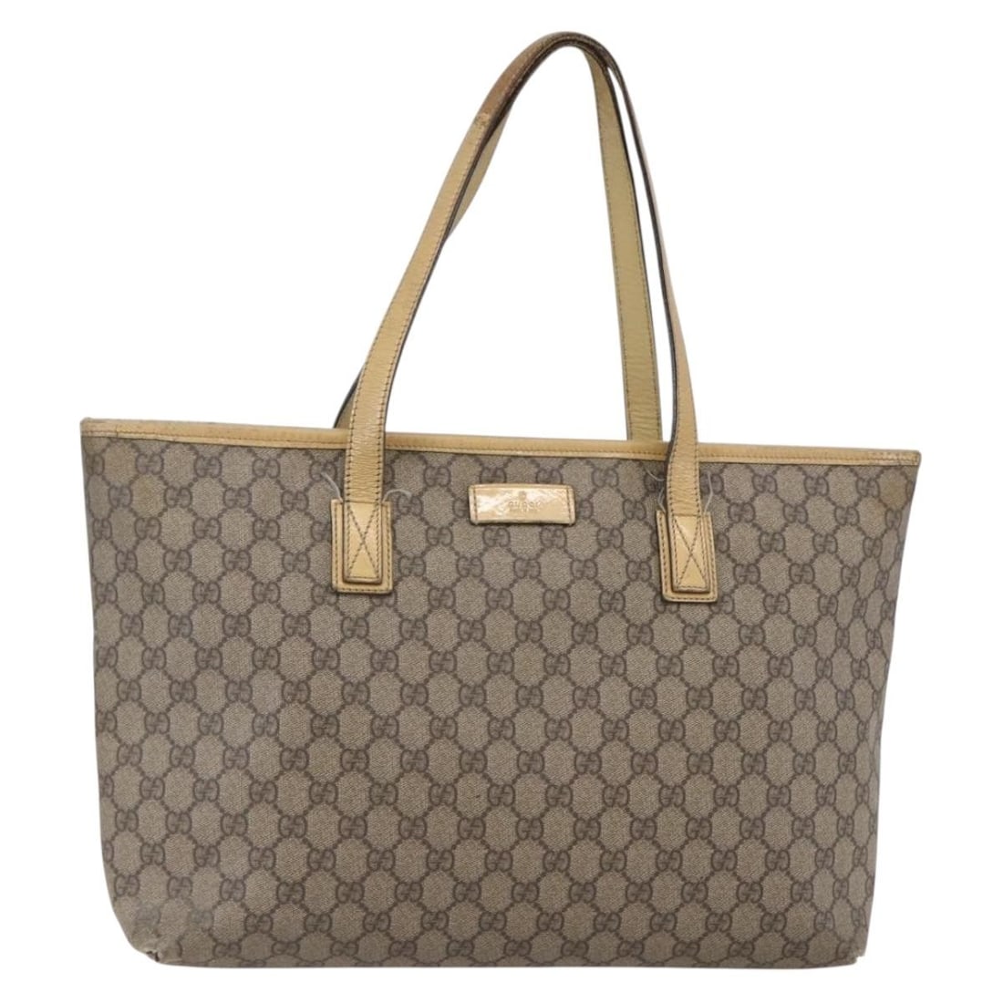 Beige PVC GG Supreme Gucci Tote Bag Model 211137 Silver Trim: Beige PVC GG Supreme Gucci Tote Bag Model 211137 Silver Trim This GUCCI GG Supreme tote bag features a beige and silver color scheme with a PVC leather and GG canvas exterior. The bag is designed with