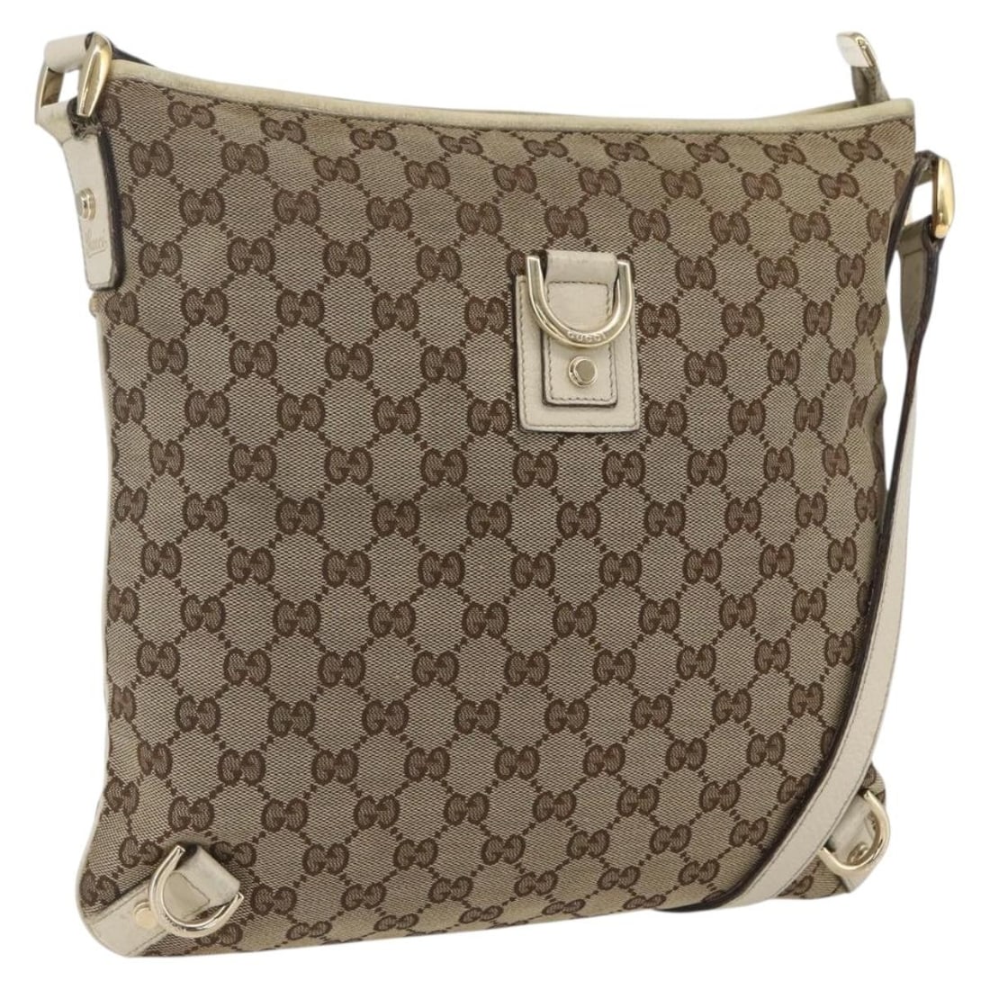 Beige Gold GG Canvas 131326 Shoulder Bag by Gucci Italy: Beige Gold GG Canvas 131326 Shoulder Bag by Gucci Italy This GUCCI GG Canvas shoulder bag features a beige and gold color combination with the signature GG canvas exterior. The bag is made in Italy an