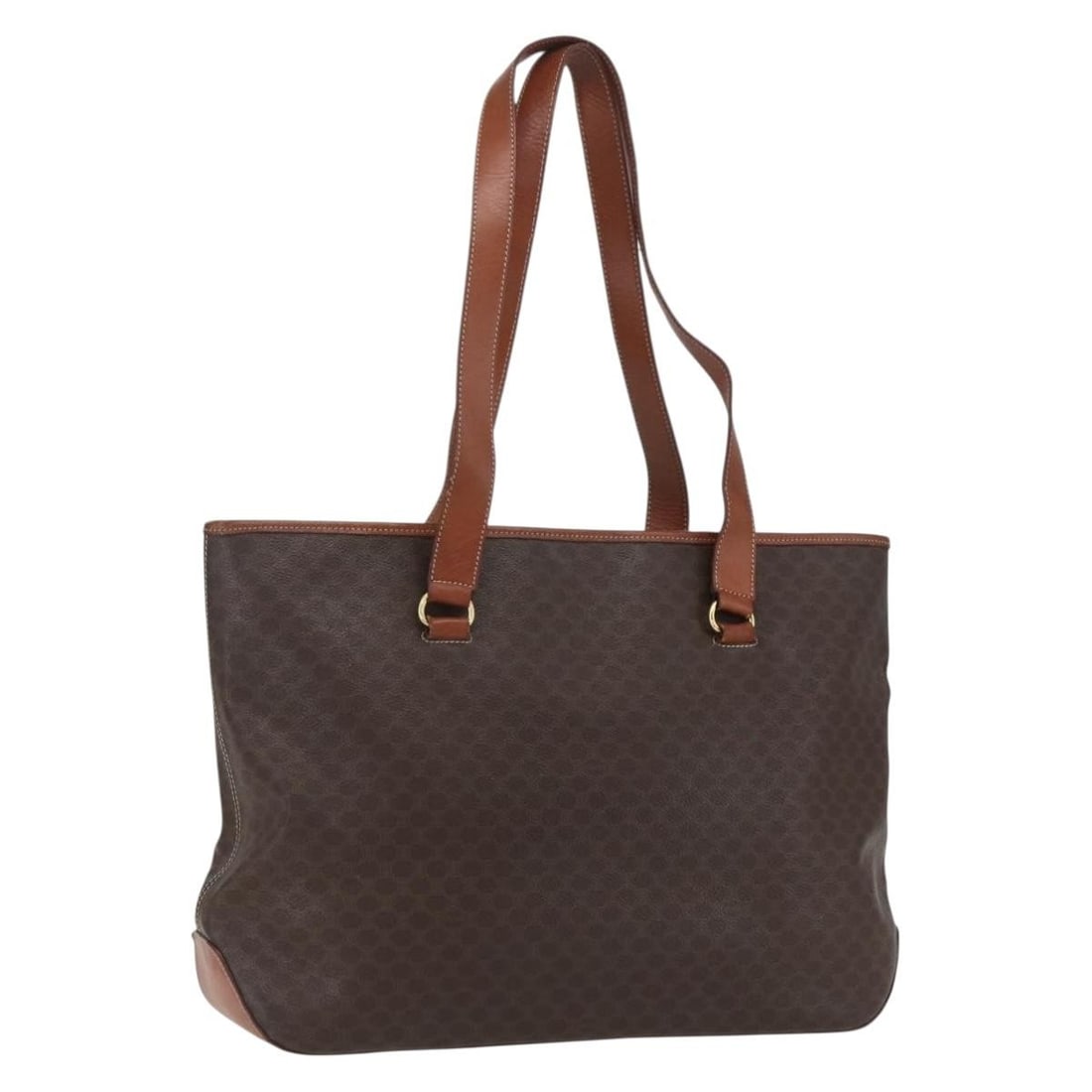 Brown Gold Macadam Canvas Tote with PVC Leather by CELINE 163954: Brown Gold Macadam Canvas Tote with PVC Leather by CELINE 163954 This CELINE tote bag features a combination of Macadam canvas and PVC leather in brown and gold tones. Crafted in Italy, it offers a sp