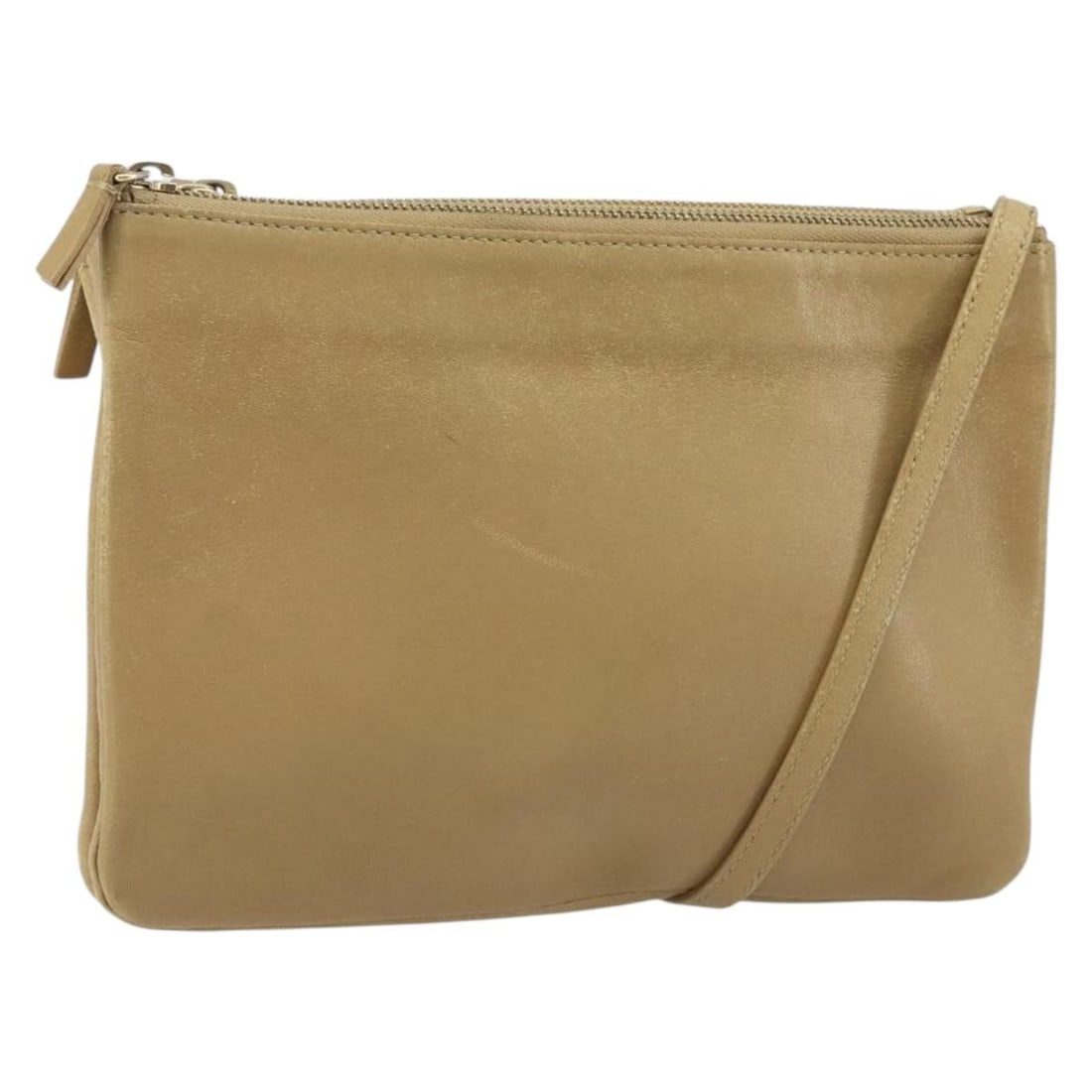 Celine Trio Beige Leather Shoulder Bag with Gold Accent: Celine Trio Beige Leather Shoulder Bag with Gold Accent This is a Celine Trio shoulder bag crafted from beige and gold leather. The bag features an adjustable shoulder strap with a drop between 18.1 a