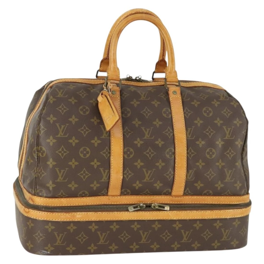 Louis Vuitton M41444 Monogram Canvas Boston Bag with Name Tag: Louis Vuitton M41444 Monogram Canvas Boston Bag with Name Tag This Louis Vuitton Monogram Sac Sports Boston Bag, model M41444, features the iconic monogram canvas exterior, designed for women. The bag