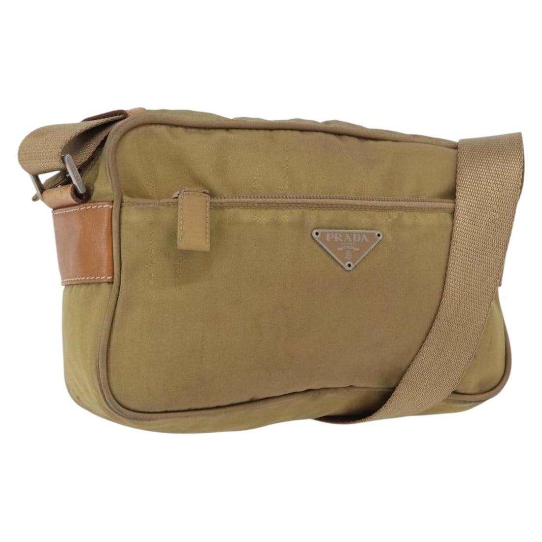 Prada Beige Nylon Shoulder Bag with Silver Hardware bs33242: Prada Beige Nylon Shoulder Bag with Silver Hardware bs33242 This PRADA shoulder bag features a beige and silver nylon exterior with adjustable shoulder strap drop from 9.8 to 19.7 inches. Made in Ital