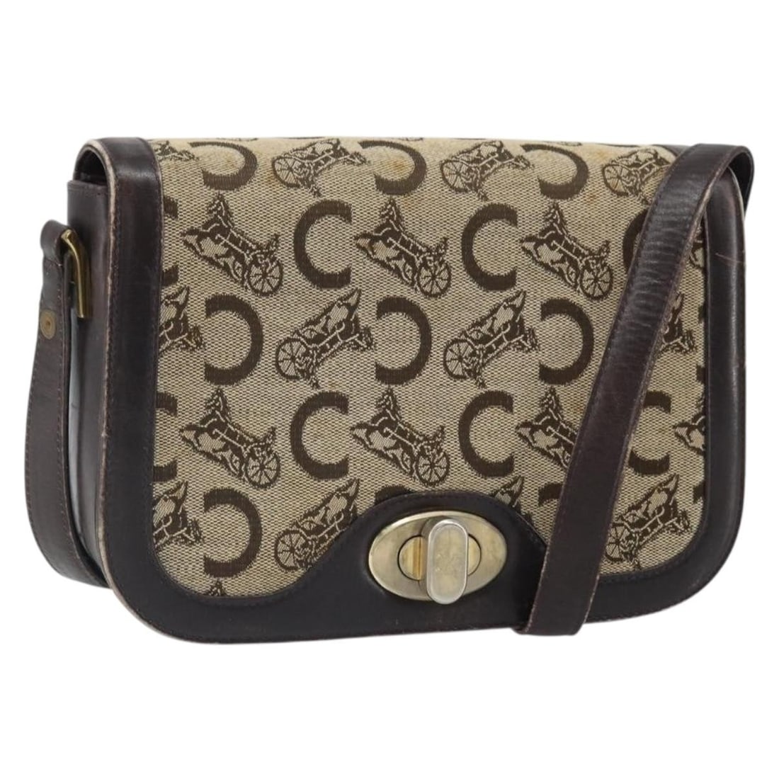 Beige Canvas Celine C Sulky Shoulder Bag Gold Accents 166644: Beige Canvas Celine C Sulky Shoulder Bag Gold Accents 166644 This CELINE C Sulky shoulder bag features a beige and gold canvas exterior with a classic shoulder bag design. Made in Italy, it offers a p