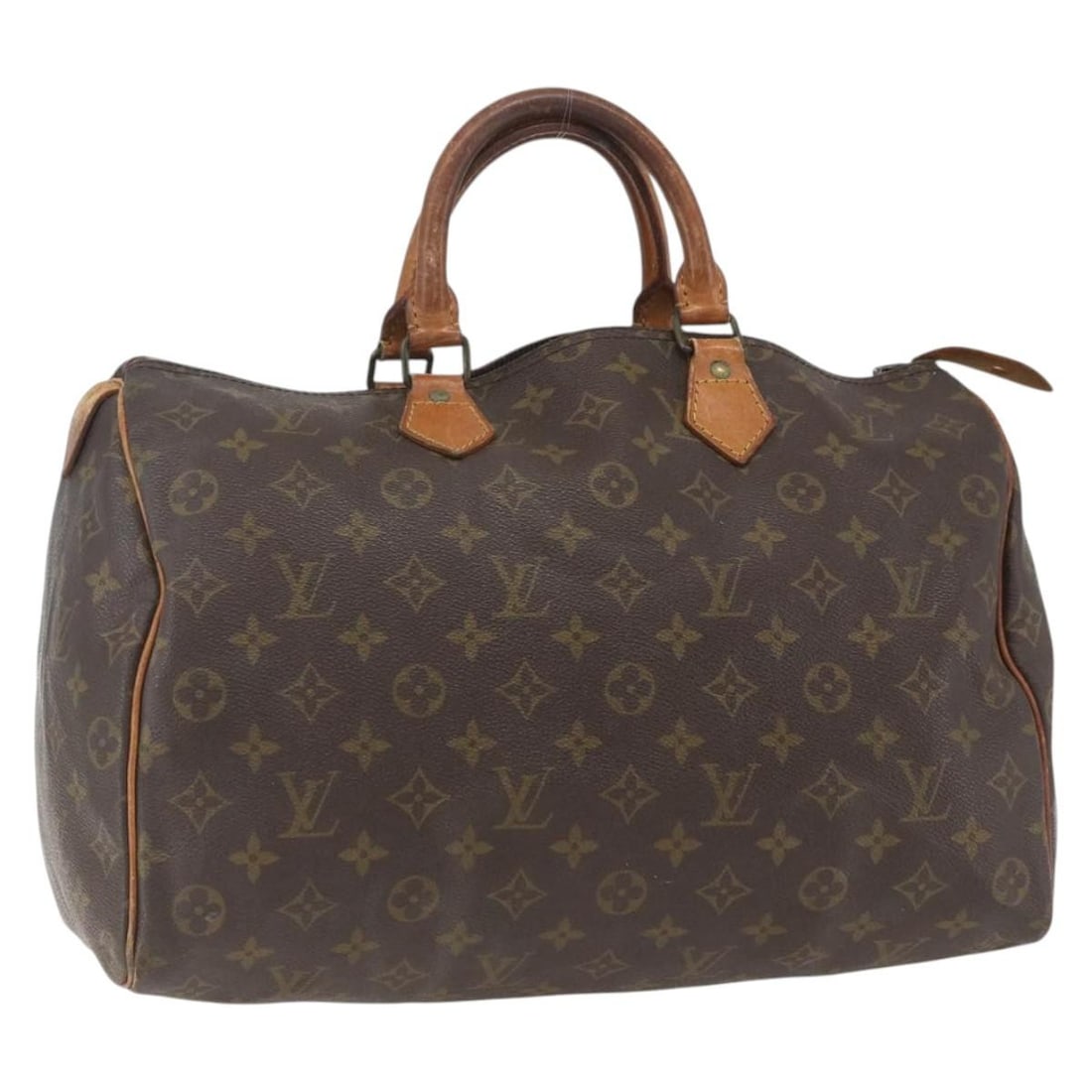 Louis Vuitton Monogram Canvas Speedy 30 Handbag M41526 Made in France: Louis Vuitton Monogram Canvas Speedy 30 Handbag M41526 Made in France This Louis Vuitton Speedy 30 handbag is crafted from Monogram Canvas and originates from France. The bag shows signs of heavy use