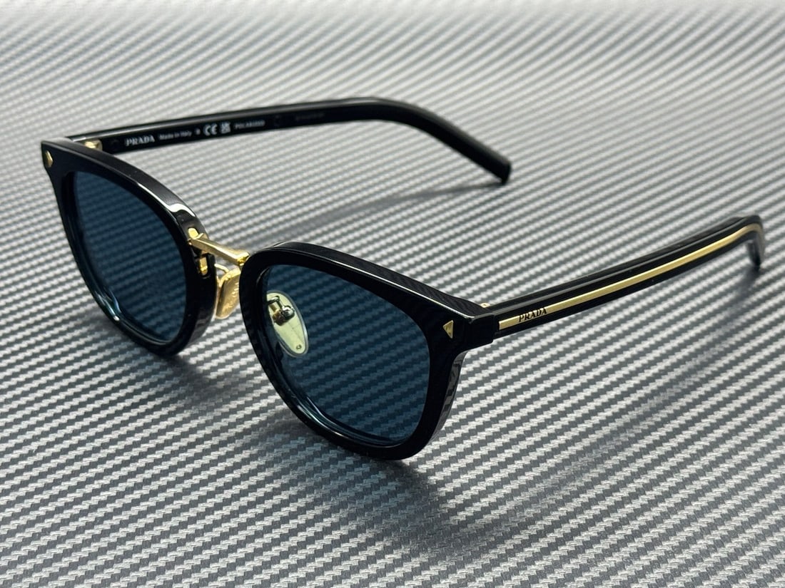 PRADA PR C01SD 16K04D Polarized Black Green 52mm Men's Sunglasses with Case: PRADA PR C01SD 16K04D Polarized Black Green 52mm Men's Sunglasses with Case These Prada PR C01SD 16K04D sunglasses feature a black frame paired with green polarized lenses, offering both style and gla