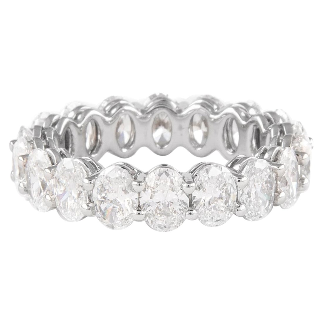 4.98ct Oval Diamond Eternity Band Platinum: 4.98ct Oval Diamond Eternity Band Platinum This exquisite oval cut diamond eternity band features 18 brilliant cut diamonds totaling 4.98 carats, showcasing a stunning F/G color and VS clarity. Crafte