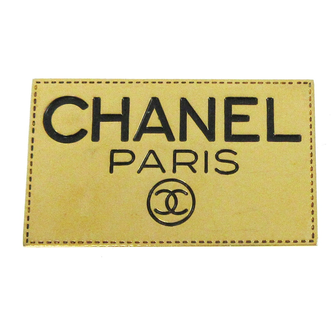 Chanel Logo Gold-tone Brooch Pin: Chanel Logo Gold-tone Brooch Pin Enhance your accessory collection with this exquisite Chanel Plate Brooch Pin. Featuring the iconic Chanel logo in a luxurious gold-tone finish, this brooch is a perfe