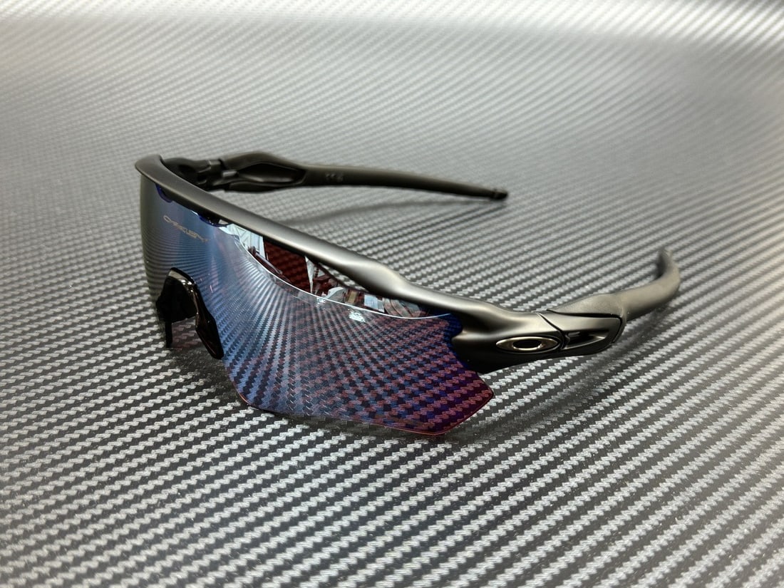 Oakley OO9208 97 Matte Black Prizm Snow Sapphire Sunglasses 65mm: Oakley OO9208 97 Matte Black Prizm Snow Sapphire Sunglasses 65mm Experience the perfect blend of style and functionality with the Oakley OO9208 97 Matte Black Prizm Snow Sapphire Sunglasses. These uni
