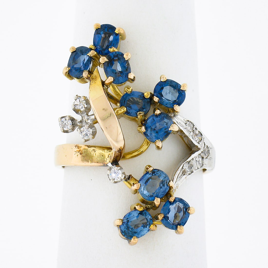 Vintage 14K Gold 1.95ctw Oval Sapphire Diamond Flower Branch Ring: Vintage 14K Gold 1.95ctw Oval Sapphire Diamond Flower Branch Ring This exquisite vintage dinner ring features a stunning floral branch design crafted from solid 14K yellow gold with elegant white gold
