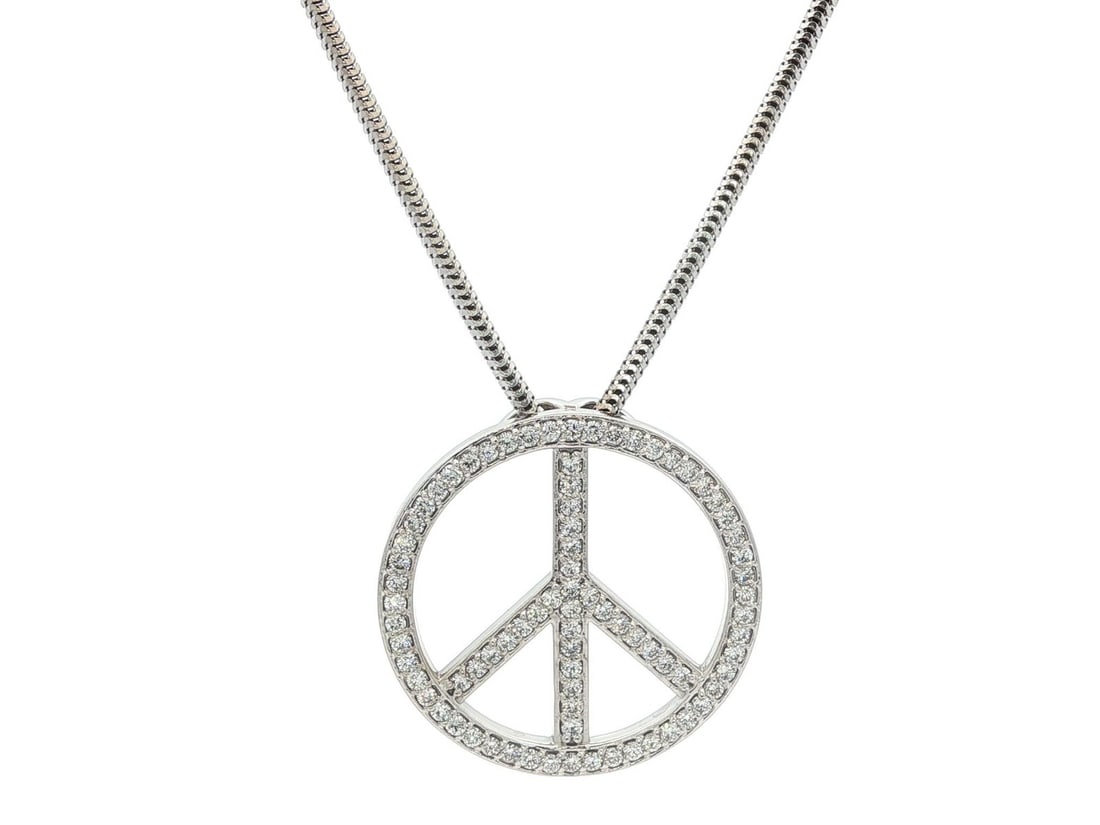 14k White Gold Pave Diamond Peace Sign Pendant Necklace 0.75ct: 14k White Gold Pave Diamond Peace Sign Pendant Necklace 0.75ct This exquisite necklace features a stunning peace sign circle slide pendant, crafted from solid 14k white gold. The pendant is adorned wi