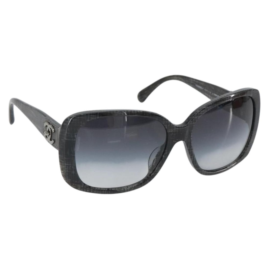 Black Plastic Sunglasses by CHANEL Model SW1988V with CC Logo: Black Plastic Sunglasses by CHANEL Model SW1988V with CC Logo These CHANEL sunglasses feature a sleek black plastic frame with the iconic CC logo. Made in Italy, they offer a stylish and timeless acce