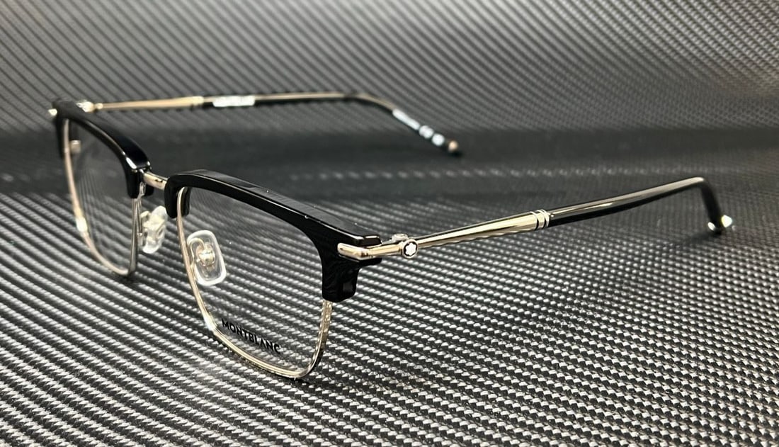 Mont Blanc MB0243O 004 Black Silver Men's Eyeglasses with Authenticity Certificate: Mont Blanc MB0243O 004 Black Silver Men's Eyeglasses with Authenticity Certificate Discover the elegance of Mont Blanc MB0243O 004 eyeglasses, designed for the modern man. These stylish frames feature