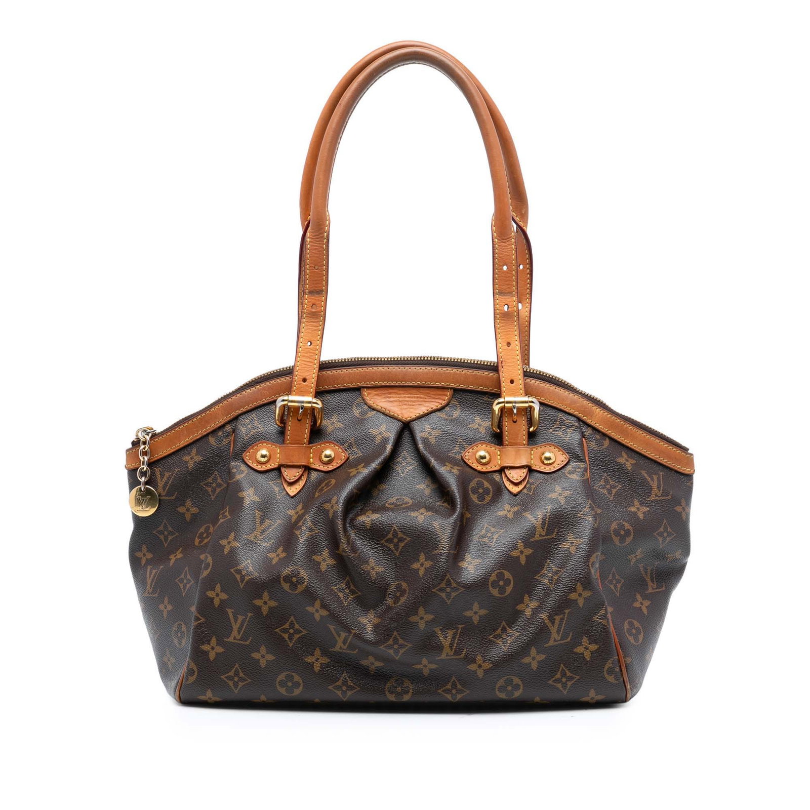 Louis Vuitton Tivoli GM Monogram Canvas Shoulder Bag with Leather Trim: Louis Vuitton Tivoli GM Monogram Canvas Shoulder Bag with Leather Trim The Louis Vuitton Monogram Tivoli GM is crafted from signature monogram canvas with vachetta leather trim and rolled vachetta lea