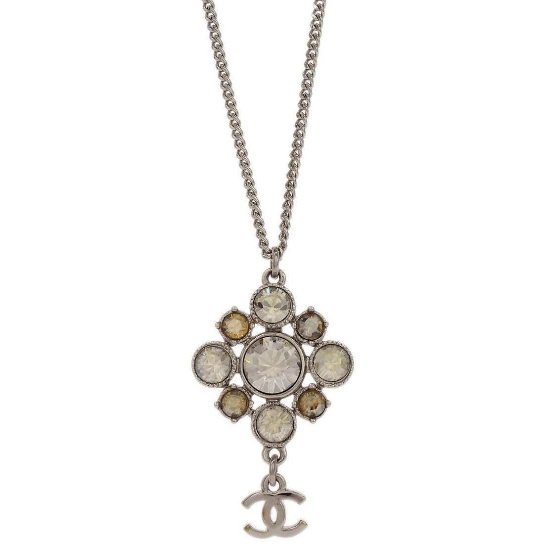 Chanel Silver Plated Pendant Necklace with Rhinestones 10V: Chanel Silver Plated Pendant Necklace with Rhinestones 10V This exquisite Chanel pendant necklace features a stylish silver-plated chain design adorned with shimmering rhinestones. The elegant pendant