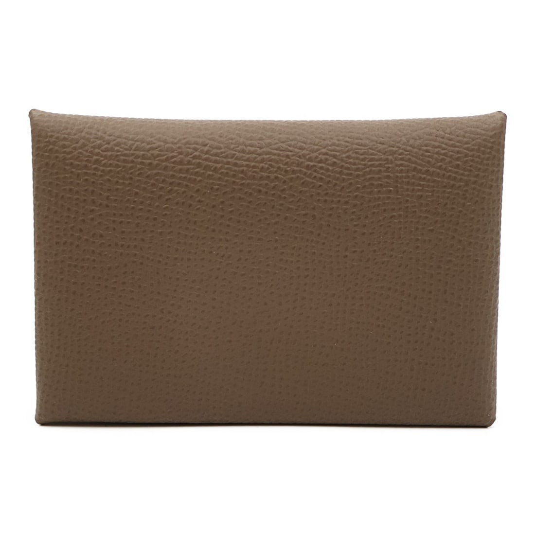 Calvi Card Holder in Etoupe Epsom Leather with Palladium Hardware: Calvi Card Holder in Etoupe Epsom Leather with Palladium Hardware This Hermes Calvi card case is crafted from Epsom calfskin leather in a sophisticated gray tone. The design provides a sleek and funct