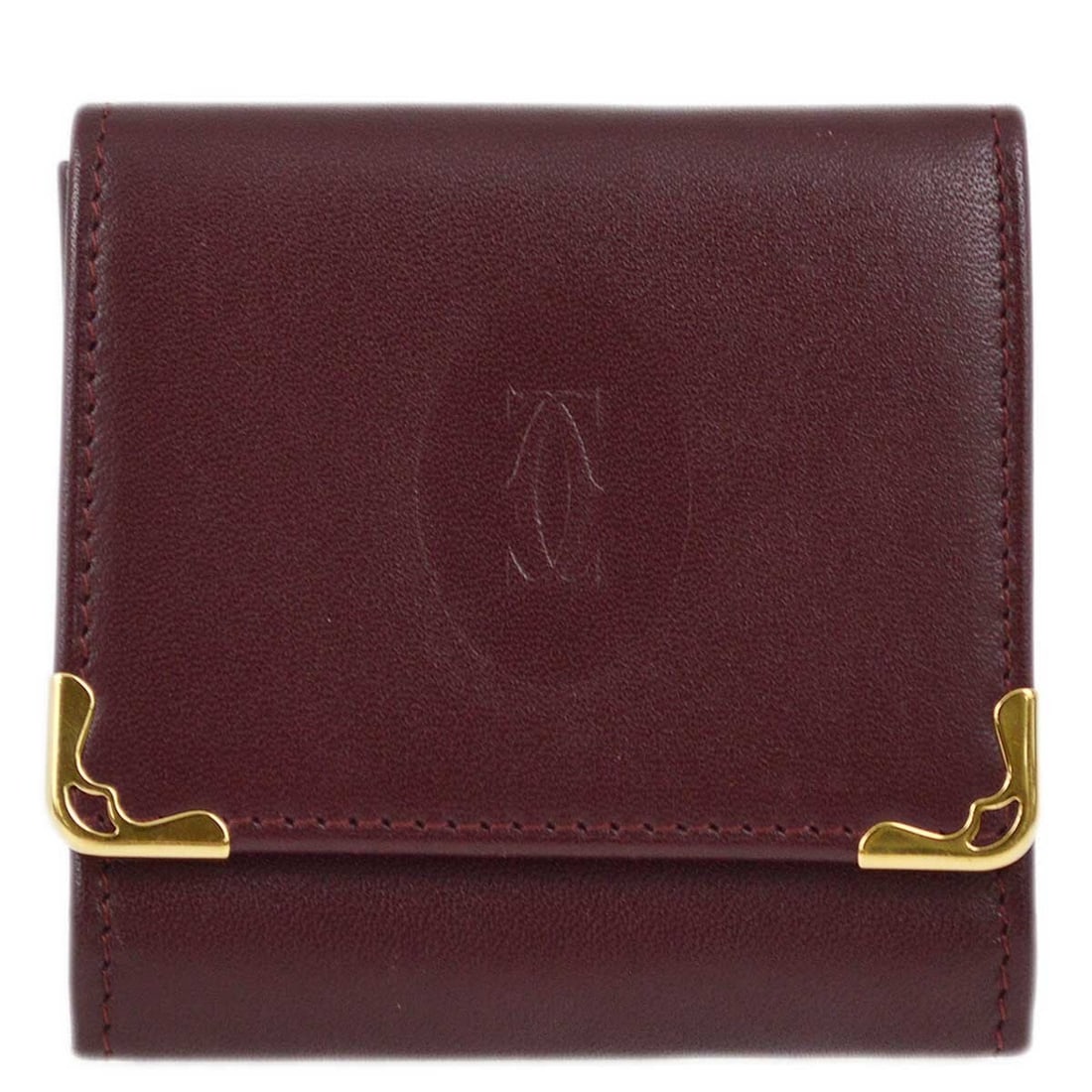 Leather Coin Wallet in Red by Cartier France: Leather Coin Wallet in Red by Cartier France This vintage Cartier coin purse wallet is crafted from red leather and features a compact, elegant design. Made in France, it showcases classic Cartier sty