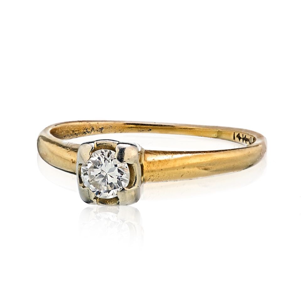 Vintage 14K Yellow Gold 0.25ct Round Cut Engagement Ring: Vintage 14K Yellow Gold 0.25ct Round Cut Engagement Ring This exquisite vintage engagement ring features a stunning round cut diamond weighing approximately 0.25 carats, elegantly set in 14K yellow go
