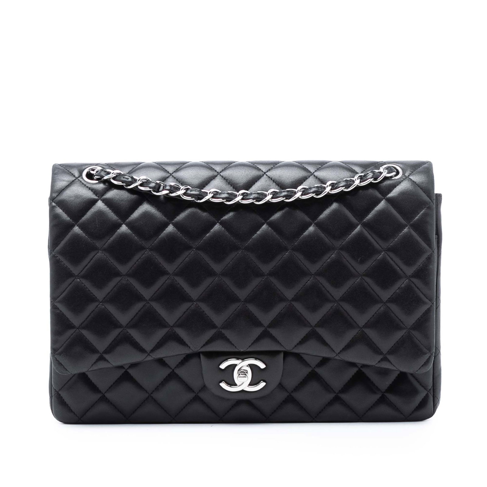 Chanel Maxi Double Flap Quilted Black Lambskin Shoulder Bag: Chanel Maxi Double Flap Quilted Black Lambskin Shoulder Bag This Chanel Maxi Classic Double Flap shoulder bag is crafted from quilted lambskin leather in black and features leather-woven chain straps.