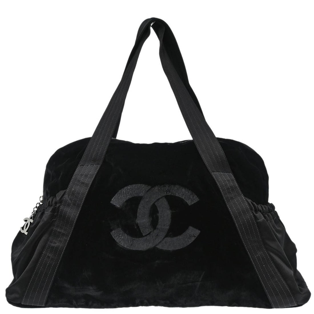 Large Black Velours Duffle Bag by Chanel with Double Handles: Large Black Velours Duffle Bag by Chanel with Double Handles This Chanel duffle handbag features a black velours exterior with double handles and a spacious large size, ideal for casual occasions. The