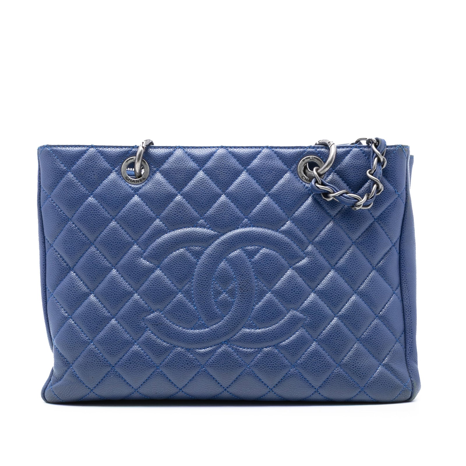 Chanel Blue Caviar Leather Grand Shopping Tote Bag with Chain Straps: Chanel Blue Caviar Leather Grand Shopping Tote Bag with Chain Straps This Chanel Grand Shopping Tote features a blue caviar leather body with curb chain straps and an open top. The bag includes an ext