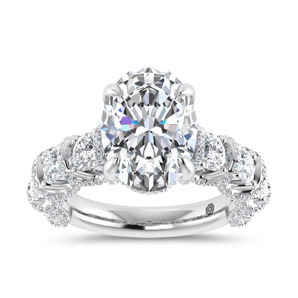 14K White Gold 7 Ct.Tw. Lab Grown Diamond Engagement Ring (IGI Certified Center 5ct): 14K White Gold 7 Ct.Tw. Lab Grown Diamond Engagement Ring (IGI Certified Center 5ct) 14k White Gold Stone Color: D-f Stone Clarity: Vs Each ring is presented in standard size 6.5. Complimentary resizi