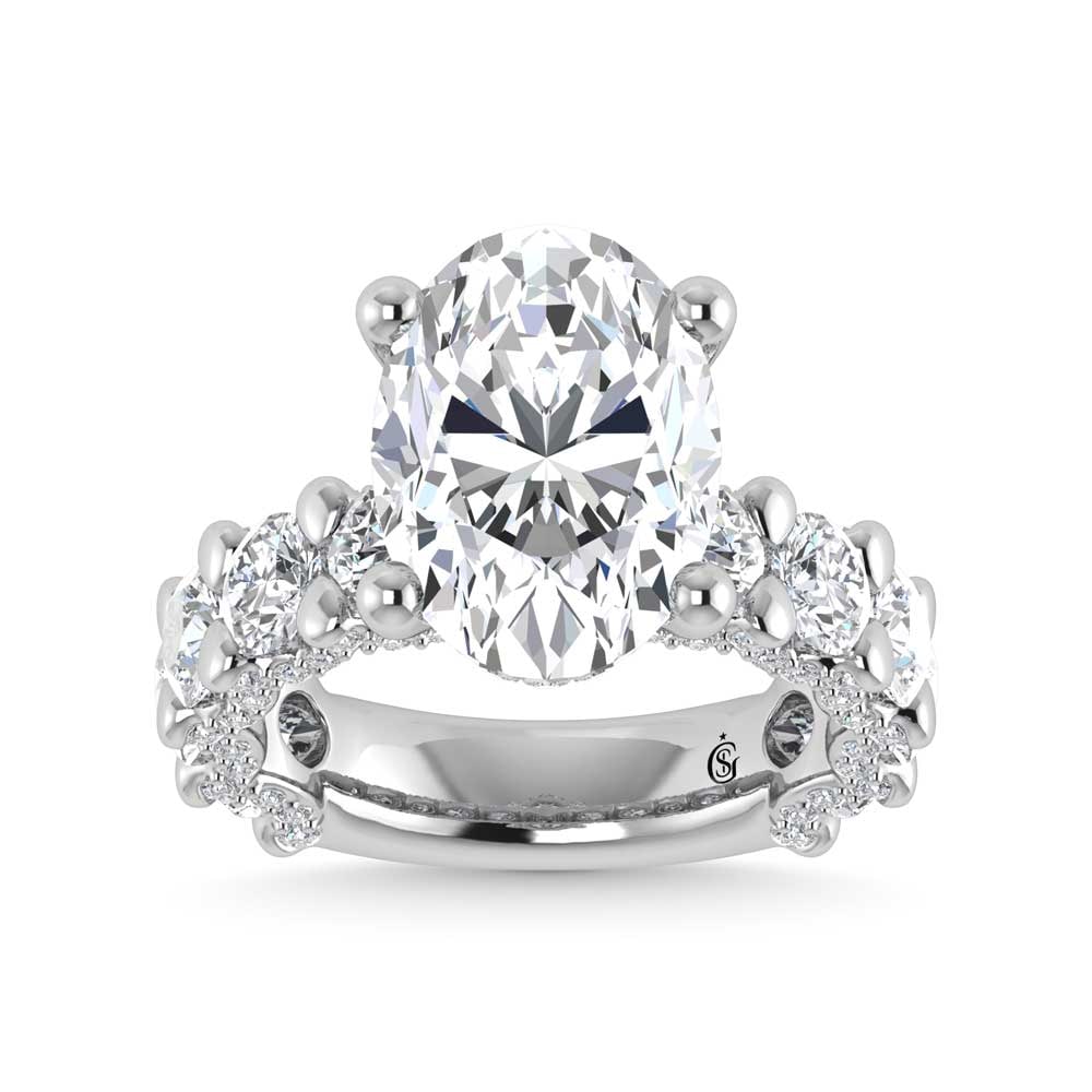 14K White Gold Lab Grown Diamond 9 1/6 Ct.Tw. Victoria Engagement Ring (IGI Certified Center 5ct): 14K White Gold Lab Grown Diamond 9 1/6 Ct.Tw. Victoria Engagement Ring (IGI Certified Center 5ct) This elegant diamond engagement ring crafted in 14k White gold, features a Oval -cut center stone of 5