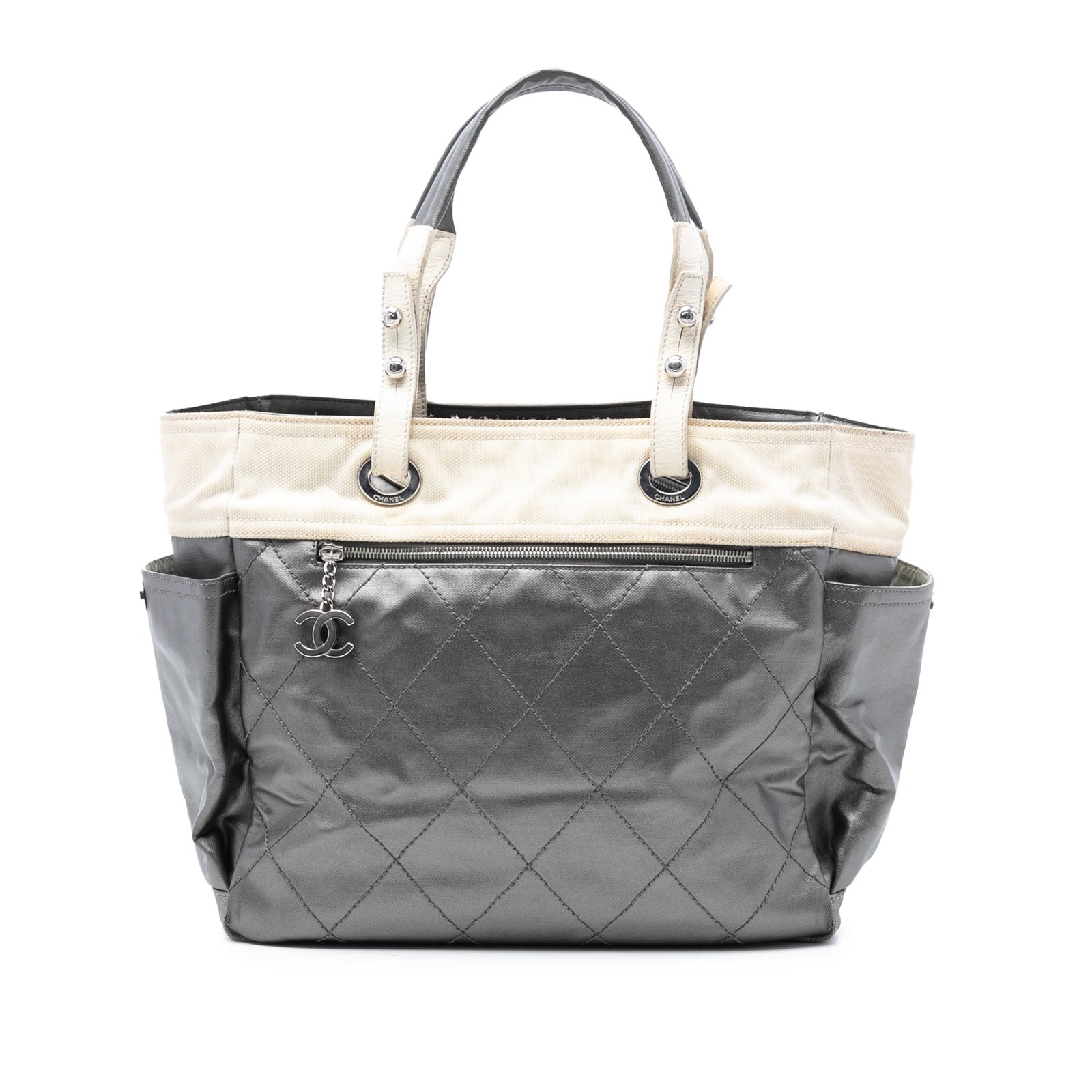 Large Paris Biarritz Tote in Quilted Gray Coated Canvas with Leather Handles: Large Paris Biarritz Tote in Quilted Gray Coated Canvas with Leather Handles This Chanel Large Bicolor Quilted Coated Canvas Paris Biarritz Tote features a durable coated canvas body with a quilted de