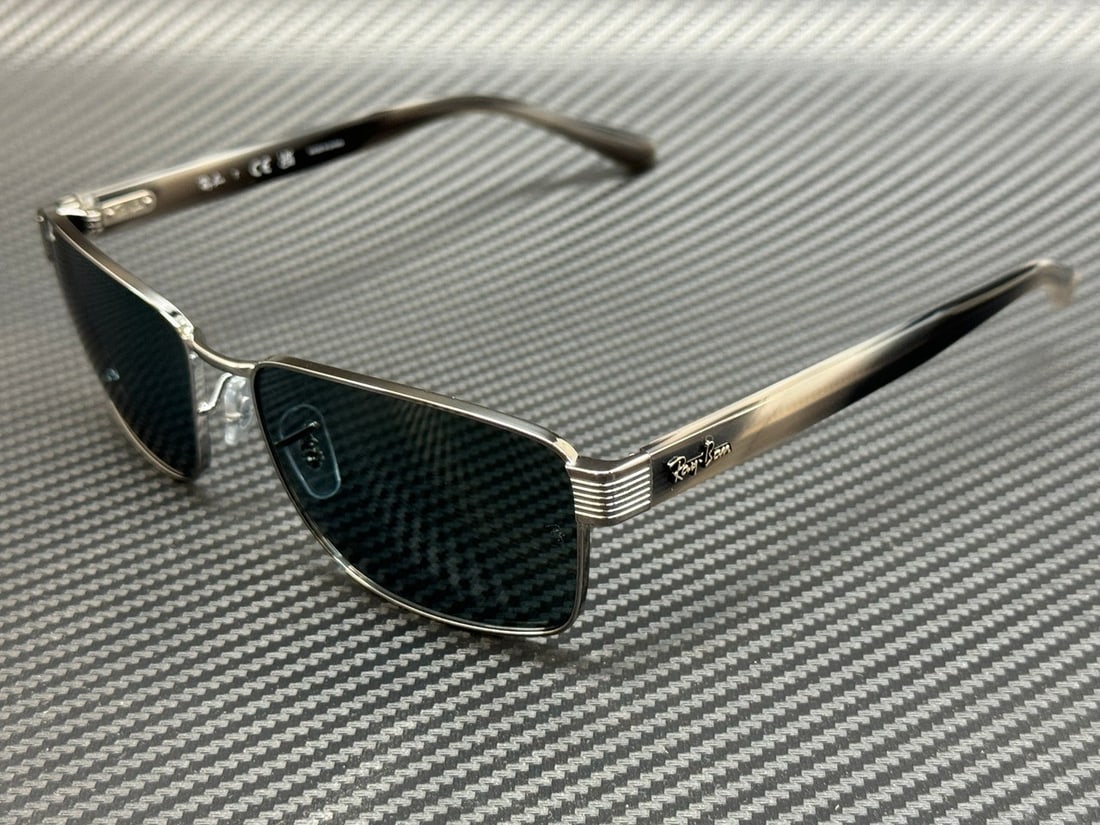Ray-Ban RB3750 Gunmetal Blue 62mm Sunglasses with Authenticity Certificate: Ray-Ban RB3750 Gunmetal Blue 62mm Sunglasses with Authenticity Certificate Elevate your style with these Ray-Ban RB3750 sunglasses, designed for men. Featuring a sleek gunmetal frame complemented by s