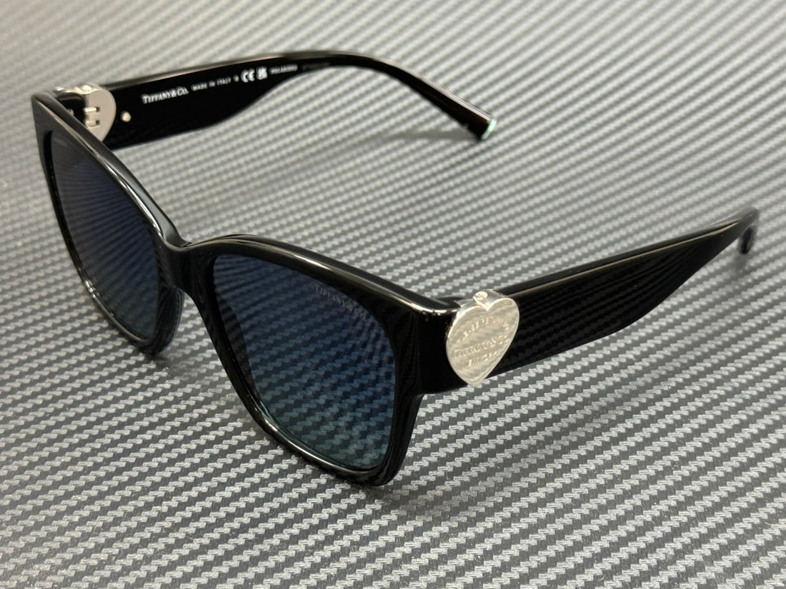 Tiffany & Co. TF4216 Black Blue Gradient Polarized Women's Sunglasses 54mm: Tiffany & Co. TF4216 Black Blue Gradient Polarized Women's Sunglasses 54mm Elevate your style with these Tiffany & Co. TF4216 sunglasses, featuring a sleek black frame complemented by blue gradient po