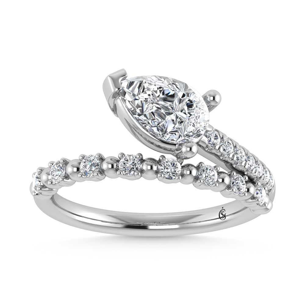 14K White Gold 1 1/4 Ct.Tw. Pear and Round Lab Grown Diamond Fashion Ring: 14K White Gold 1 1/4 Ct.Tw. Pear and Round Lab Grown Diamond Fashion Ring Crafted in sleek 14K white gold, this fashion ring showcases pear and round lab grown diamonds totaling 1 1/4 Ct.Tw. 14k White