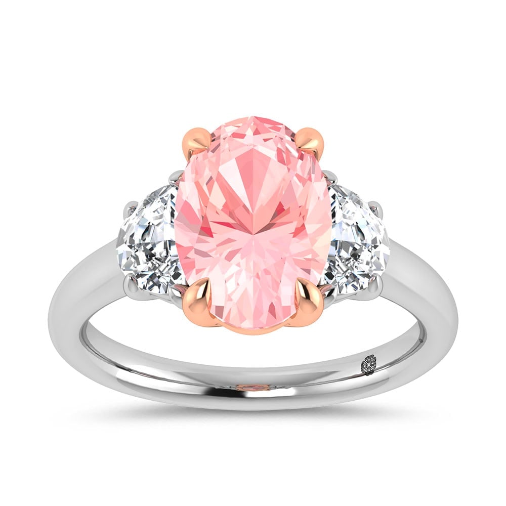 14K Two Tone Gold Lab Grown Diamond 3 1/2 Ct.Tw. Pink Oval Shape Engagement Ring (Center 3ct): 14K Two Tone Gold Lab Grown Diamond 3 1/2 Ct.Tw. Pink Oval Shape Engagement Ring (Center 3ct) Indulge in refined romance with this stunning 14K Two-Tone Gold Engagement Ring, designed to captivate wit