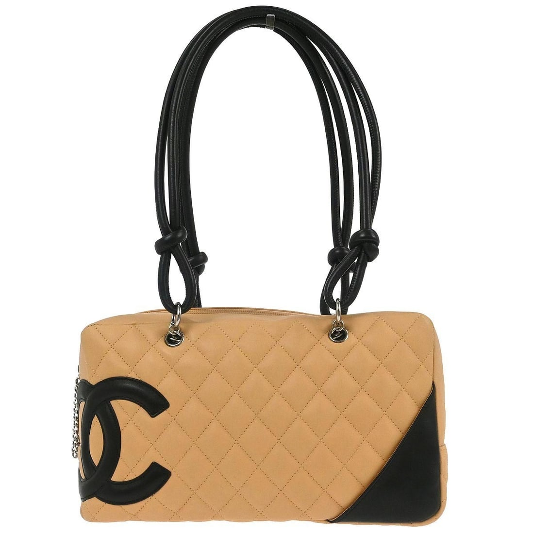 Cambon Ligne Quilted Bowling Bag in Beige Calfskin Leather by Chanel: Cambon Ligne Quilted Bowling Bag in Beige Calfskin Leather by Chanel This Chanel Cambon Ligne Bowling Bag features beige calfskin leather with a quilted matelasse pattern and black double handles. The