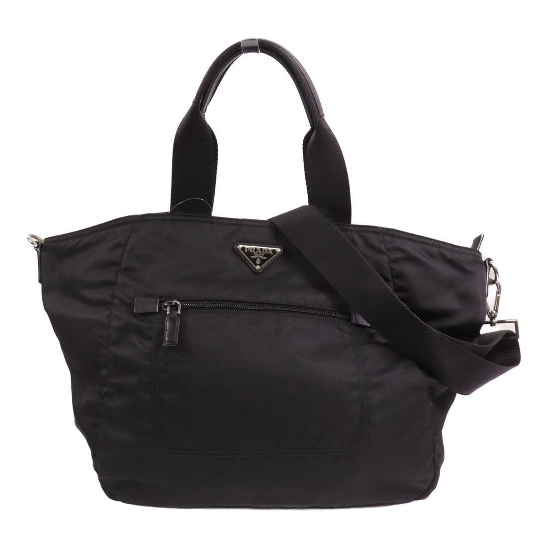 Prada Black Nylon Shoulder and Crossbody Bag with Silver Tone Hardware: Prada Black Nylon Shoulder and Crossbody Bag with Silver Tone Hardware This Prada 2-way shoulder bag is crafted from durable black nylon, offering versatility as both a shoulder and crossbody bag. Mad