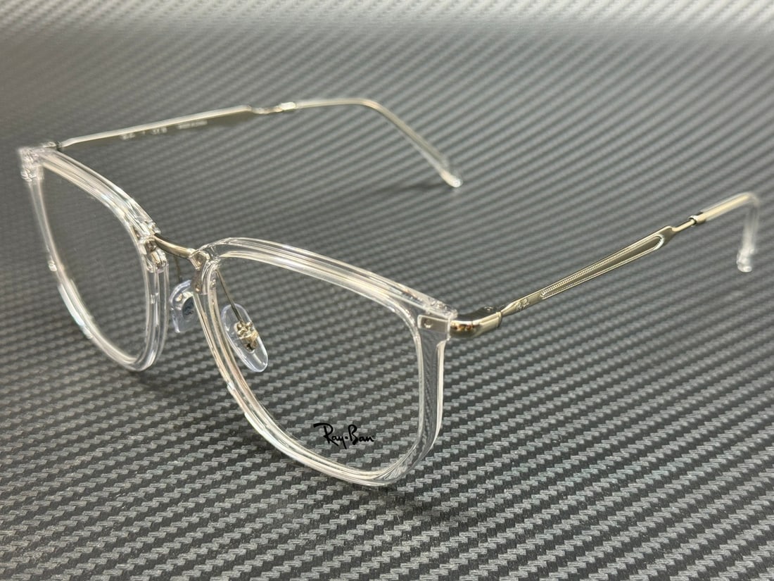 Ray-Ban RX4451V 2001 Transparent Silver Unisex Eyeglasses 53mm: Ray-Ban RX4451V 2001 Transparent Silver Unisex Eyeglasses 53mm Discover the stylish Ray-Ban RX4451V 2001 eyeglasses, featuring a contemporary transparent silver frame that is perfect for any unisex st