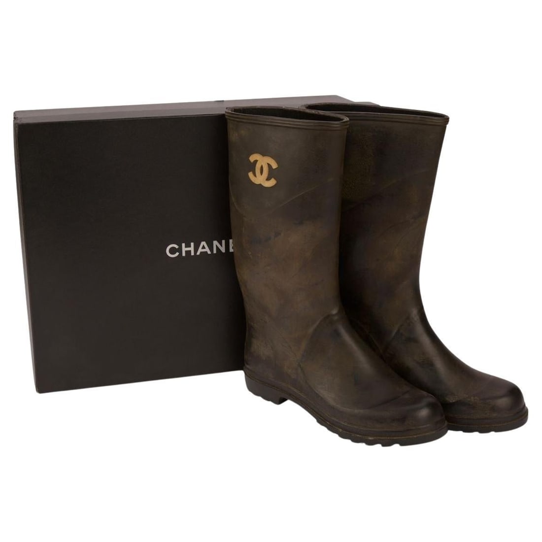 Chanel Rare Knee Length Rain Camouflage Rubber Boots: Chanel Rare Knee Length Rain Camouflage Rubber Boots Step out in style with these rare Chanel Rain Camouflage Boots, crafted from high-quality rubber for durability and comfort. Designed for the moder