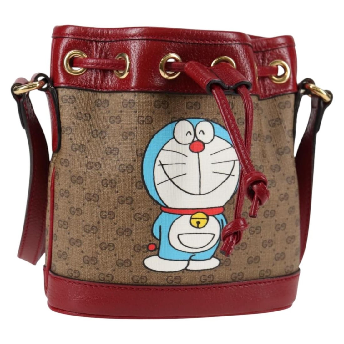 Gucci Doraemon Micro GG Supreme Beige PVC Shoulder Bag Collaboration: Gucci Doraemon Micro GG Supreme Beige PVC Shoulder Bag Collaboration This is a GUCCI Micro GG Supreme Doraemon collaboration shoulder bag crafted from beige PVC leather and micro small GG canvas. The