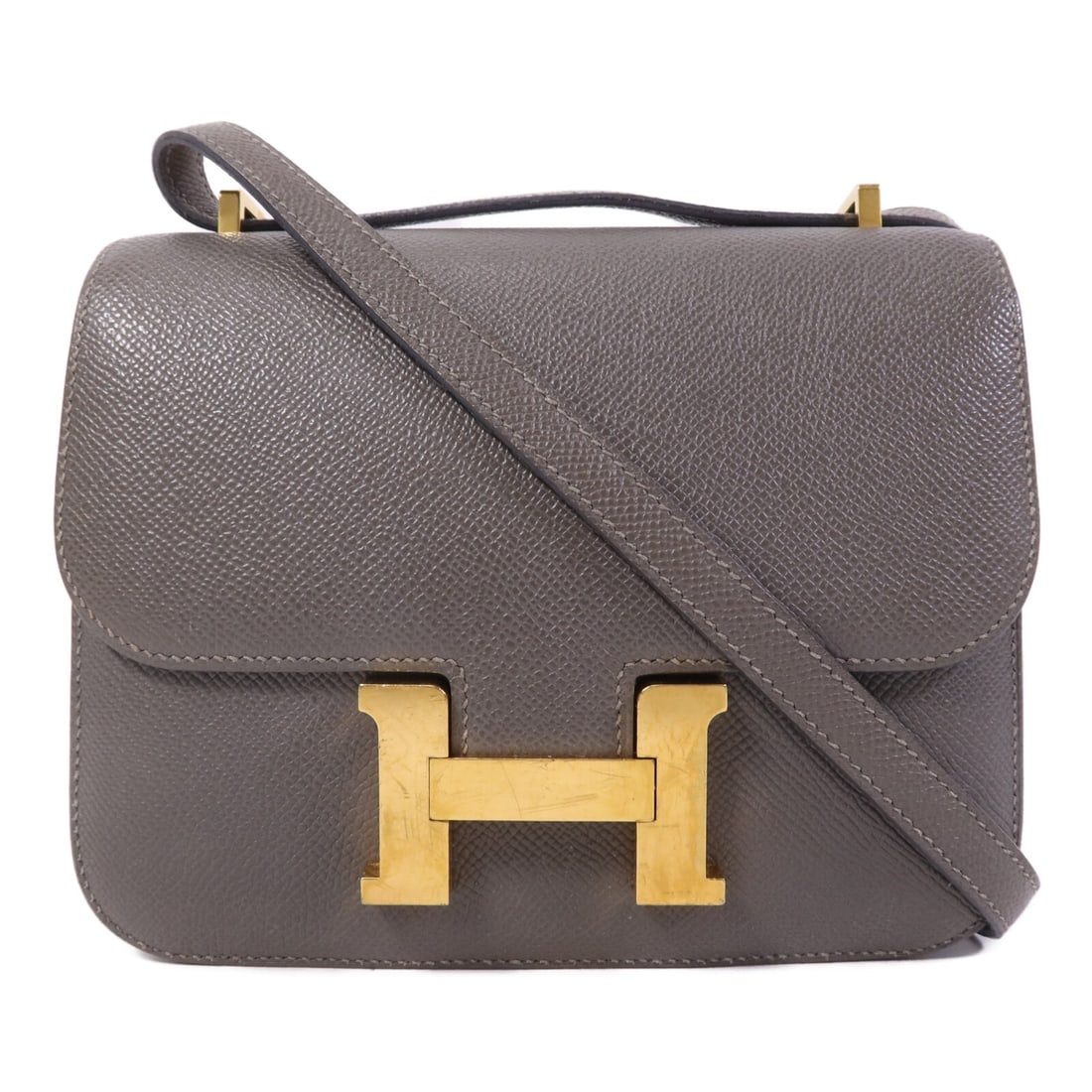 Hermes Mini Constance Gray Epsom Leather Shoulder Bag with Gold Hardware: Hermes Mini Constance Gray Epsom Leather Shoulder Bag with Gold Hardware Hermes Mini Constance shoulder bag crafted from Epsom calfskin leather in gray. This women's bag features a structured silhouet