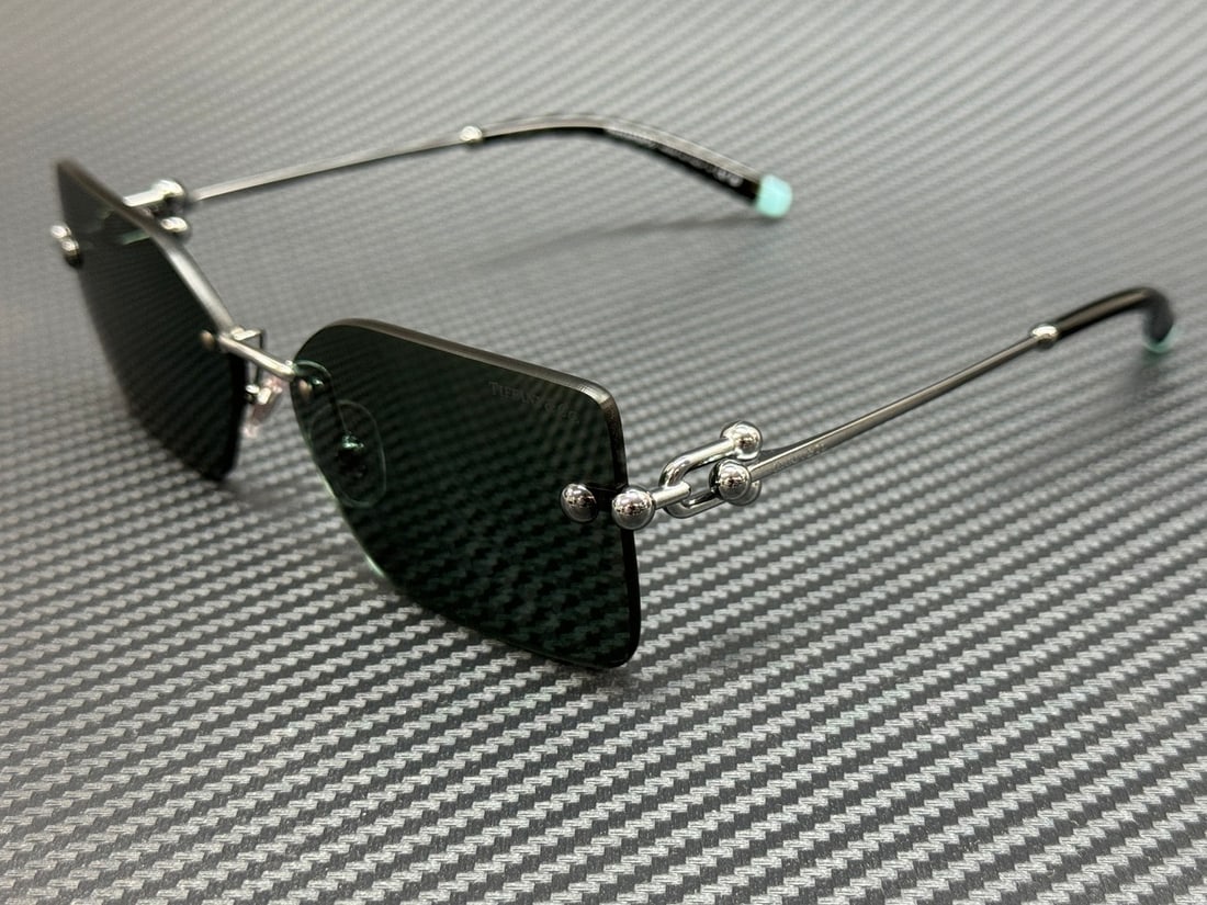 Tiffany TF3088 60033H Gunmetal Green Women's Sunglasses with Authenticity Certificate: Tiffany TF3088 60033H Gunmetal Green Women's Sunglasses with Authenticity Certificate Elevate your style with these Tiffany & Co. TF3088 60033H sunglasses, expertly crafted for women. The sophisticate