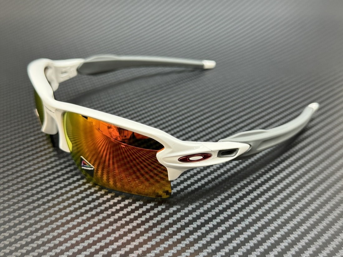 OAKLEY OO9188 93 Polished White Prizm Ruby Sports Sunglasses: OAKLEY OO9188 93 Polished White Prizm Ruby Sports Sunglasses Experience the perfect blend of style and performance with the Oakley OO9188 93 Polished White Prizm Ruby Sunglasses. Designed for outdoor