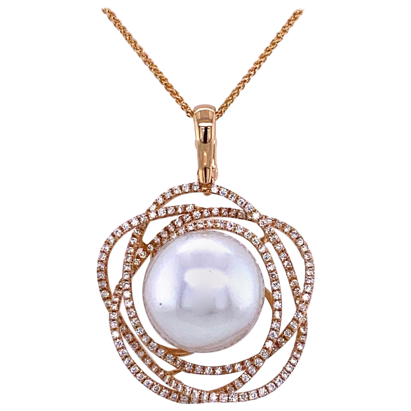 Harbor Diamonds 18K Yellow Gold South Sea Pearl Diamond Pendant 0.68 Carat: Harbor Diamonds 18K Yellow Gold South Sea Pearl Diamond Pendant 0.68 Carat This exquisite pendant showcases a stunning South Sea Pearl measuring 13-14 mm, elegantly complemented by 186 round brilliant