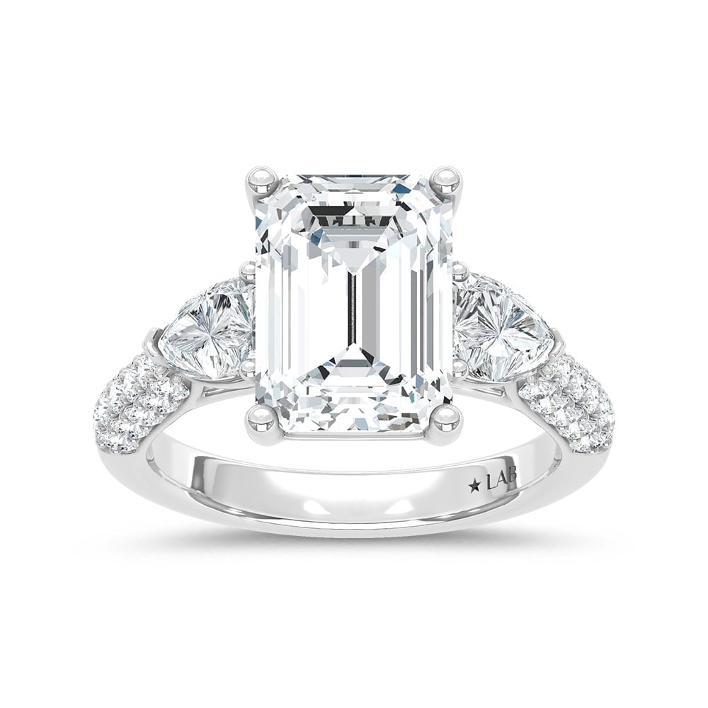 14K White Gold Lab Grown Diamond 6 3/8 Ct.Tw. Emerald and Round Shape Engagement Ring (IGI Certified: 14K White Gold Lab Grown Diamond 6 3/8 Ct.Tw. Emerald and Round Shape Engagement Ring (IGI Certified Center 5ct) This stunning three-stone ring features a sparkling 5 CT Emerald Center diamond with tw