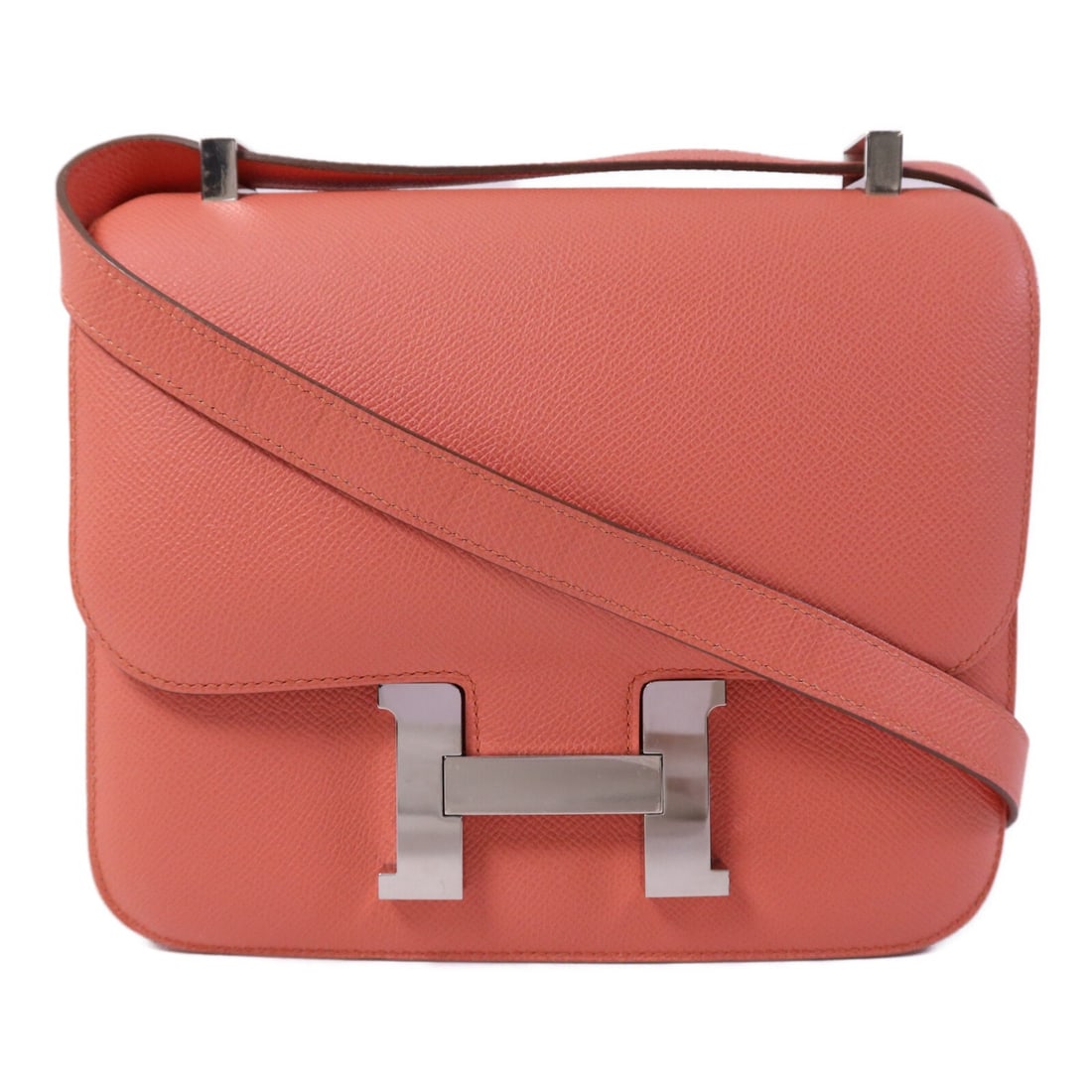 Constance 24 Orange Epsom Leather Shoulder Bag with Palladium Hardware by Hermes: Constance 24 Orange Epsom Leather Shoulder Bag with Palladium Hardware by Hermes This Hermes Constance 24 shoulder bag is crafted from Epsom calfskin leather in a vibrant orange shade. Designed for wo