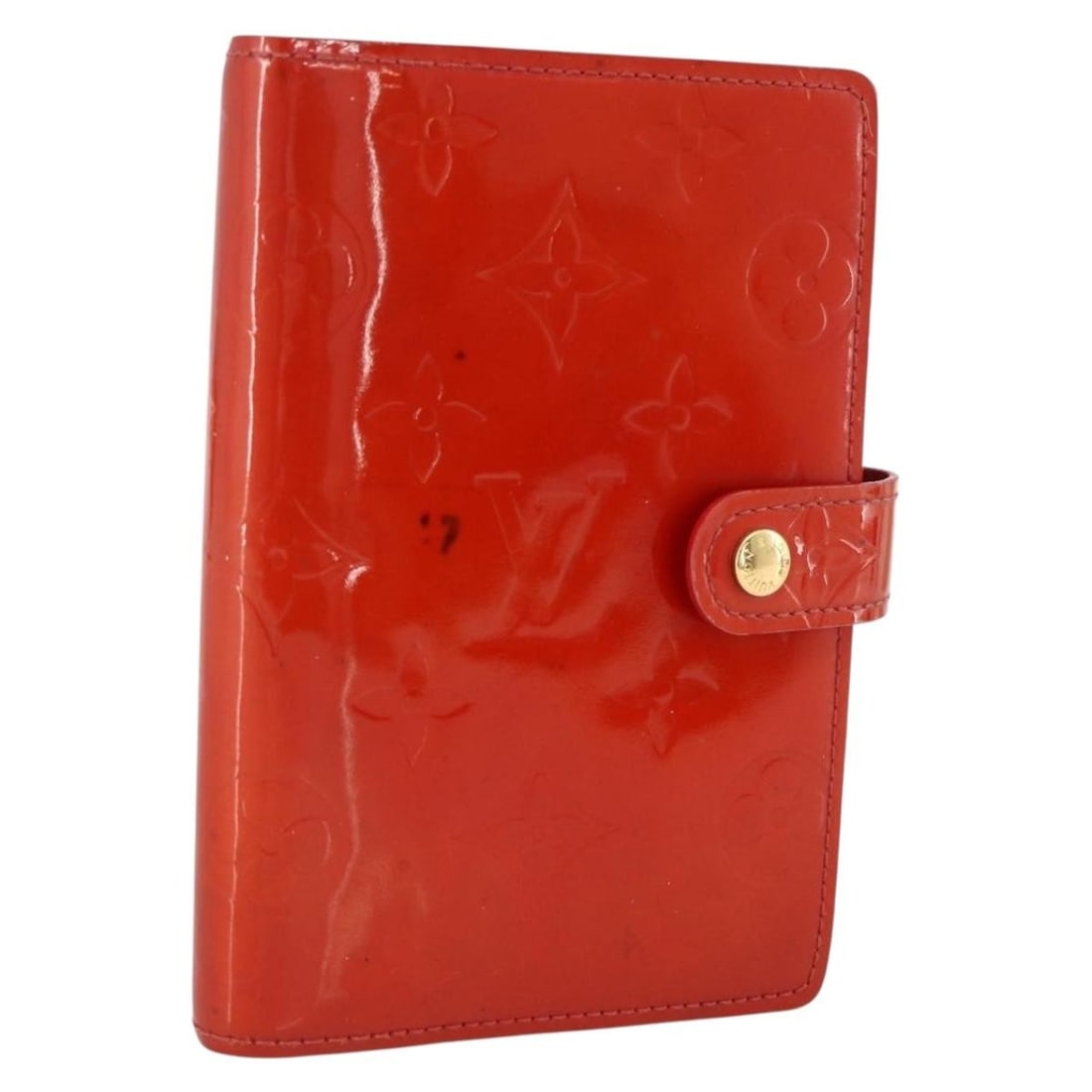 Rouge Vernis Patent Leather Agenda PM Planner Cover R21003 by Louis Vuitton: Rouge Vernis Patent Leather Agenda PM Planner Cover R21003 by Louis Vuitton This Louis Vuitton Vernis Agenda PM Day Planner Cover is crafted from patent leather in a rich rouge color. Designed for wom