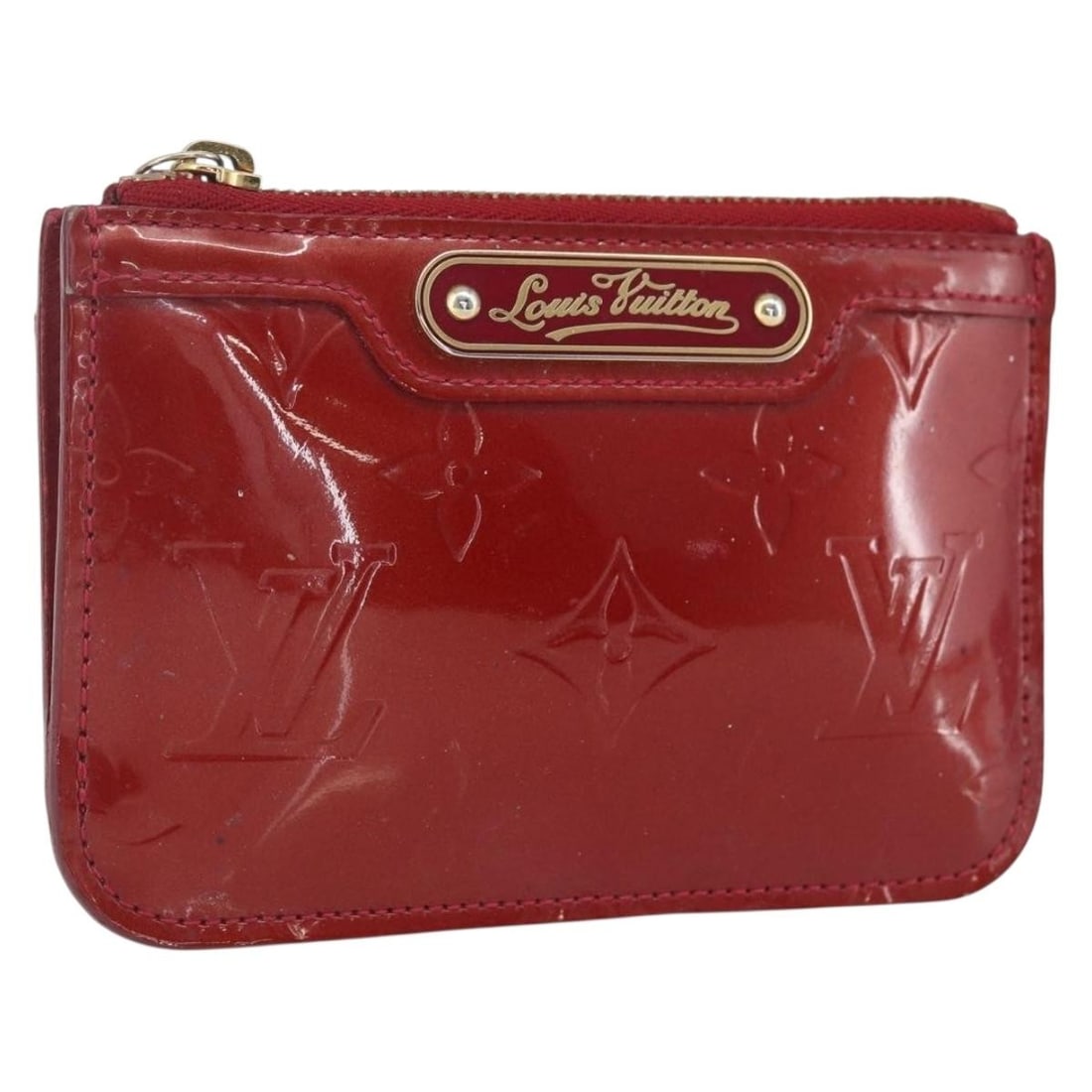 Louis Vuitton Vernis Rouge Grunadine Patent Leather Coin Purse M91737: Louis Vuitton Vernis Rouge Grunadine Patent Leather Coin Purse M91737 This is a Louis Vuitton Vernis Pochette Cle NM coin purse in Rouge Grenadine patent leather. The item is made in Spain and feature