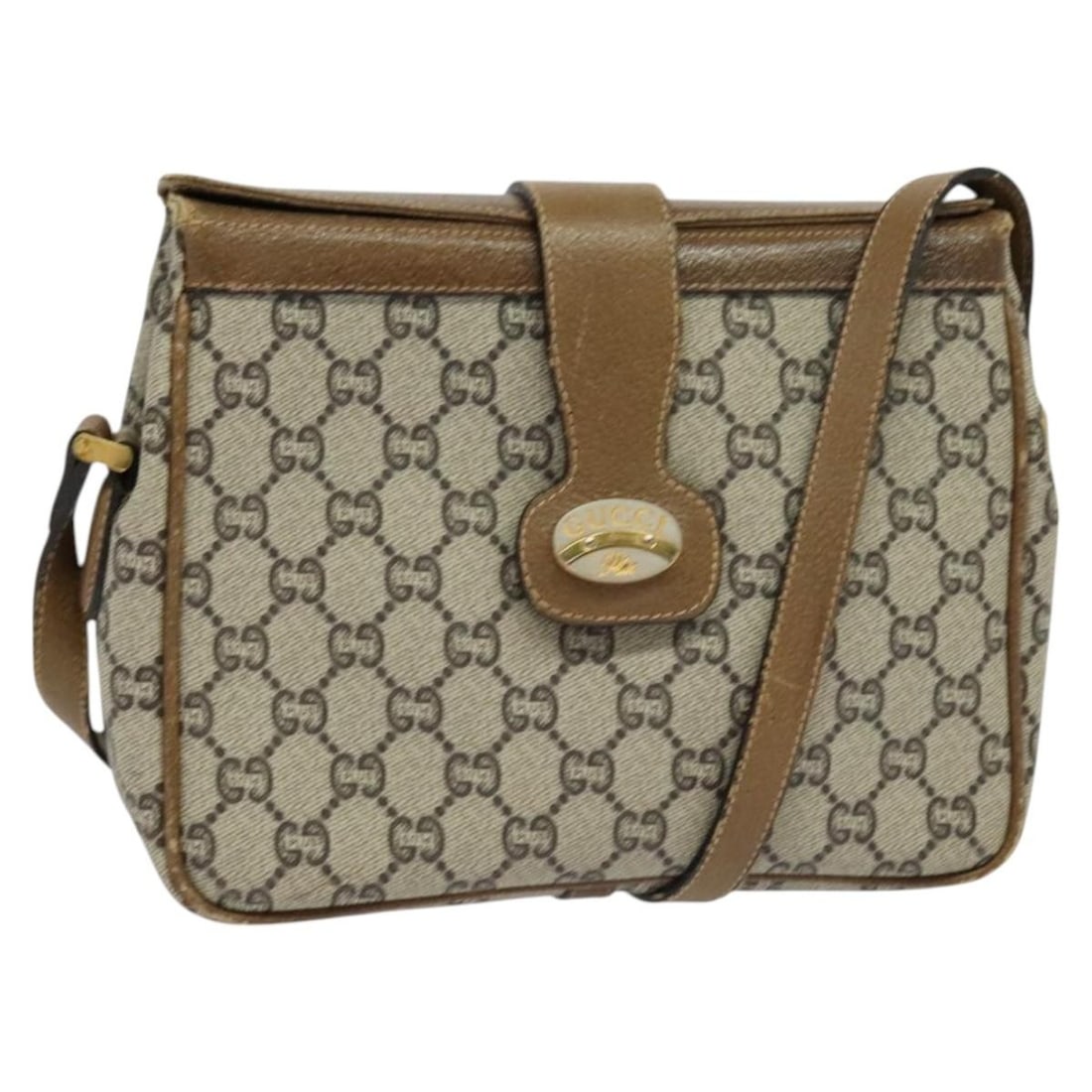 Gucci GG Supreme Beige Gold PVC Canvas Shoulder Bag for Women: Gucci GG Supreme Beige Gold PVC Canvas Shoulder Bag for Women This is a Gucci GG Plus Supreme shoulder bag crafted from PVC leather and GG canvas in beige and gold tones. Designed for women, this Ital