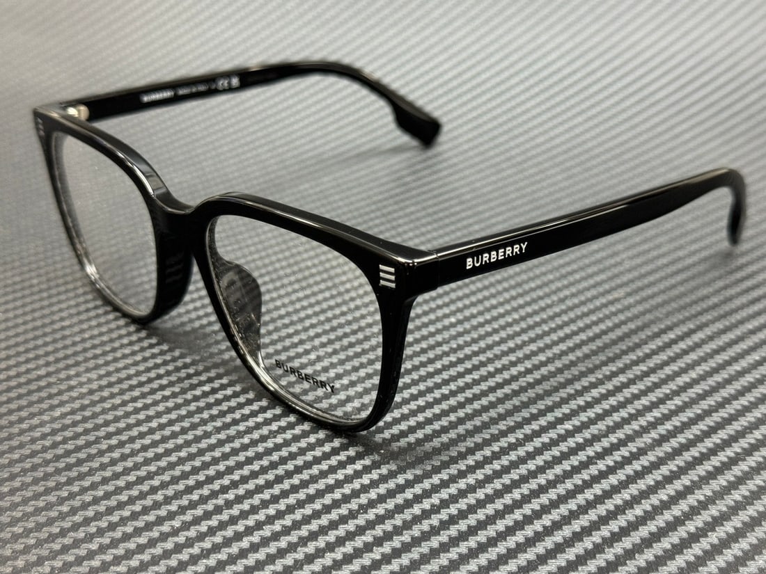 Burberry BE2361D 3001 Black Men's Eyeglasses with Authenticity Certificate: Burberry BE2361D 3001 Black Men's Eyeglasses with Authenticity Certificate Presenting the Burberry BE2361D 3001 eyeglasses, a stylish addition to any man's accessory collection. This frame boasts a sl