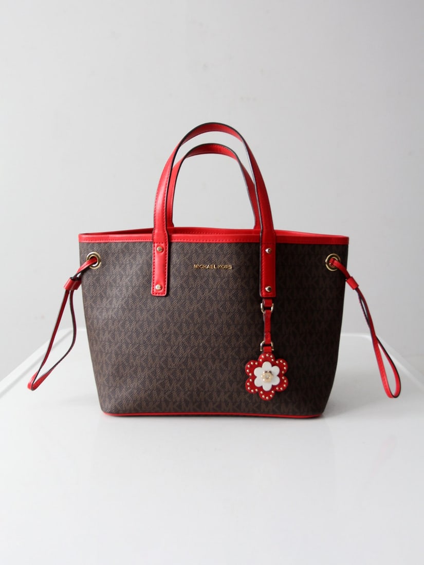 Michael Kors Carter Tote Bag Red Leather Trim Signature Print: Michael Kors Carter Tote Bag Red Leather Trim Signature Print Enhance your everyday look with the Michael Kors Carter Signature Tote Bag. This stylish tote features the iconic MK signature print compl